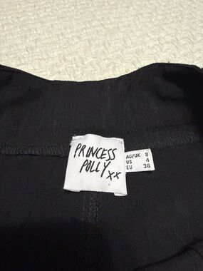 Princess Polly women’s black trouser, size 4. Excellent condition.